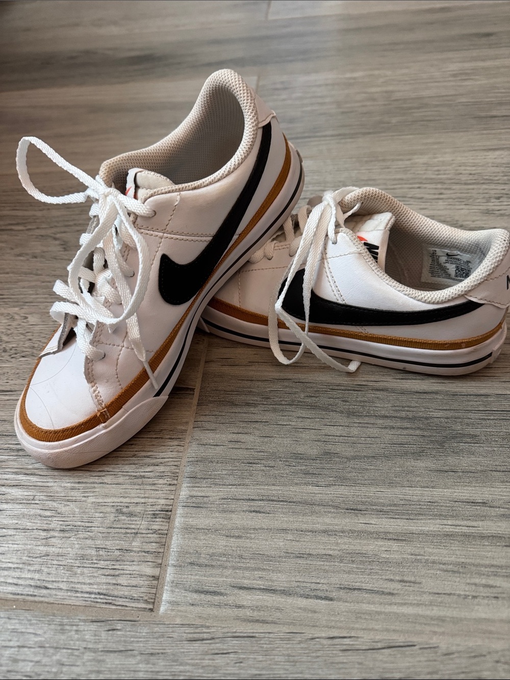 Nike Court LEGACY White Low-Top Sneakers with Black Swoosh and Mustard trim
